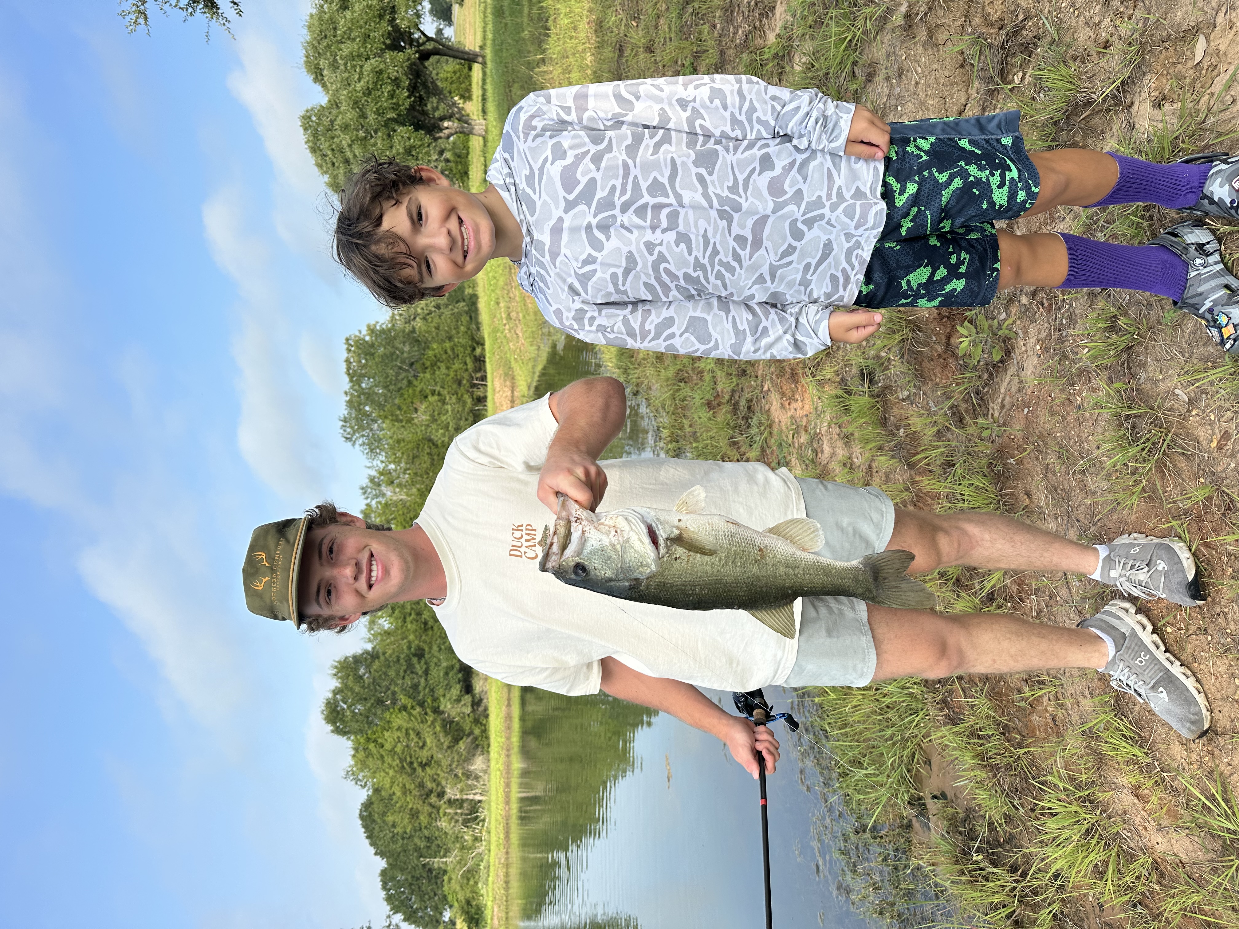 Brothers, one rod, one fat bass.